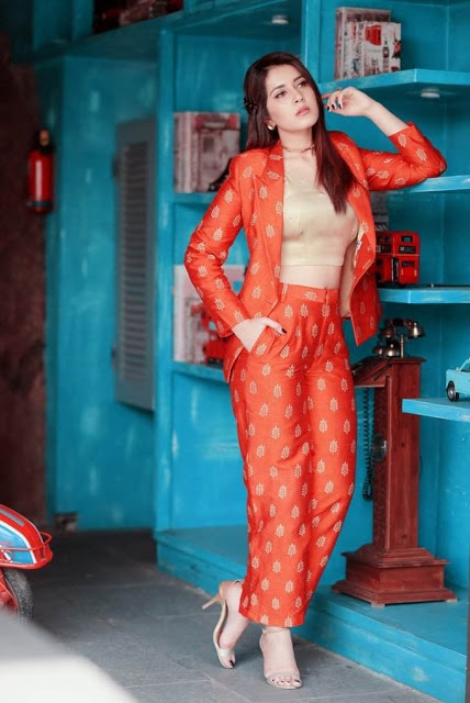 Raashi Khanna latest Photo Shoot In Long Hair Orange Dress 7
